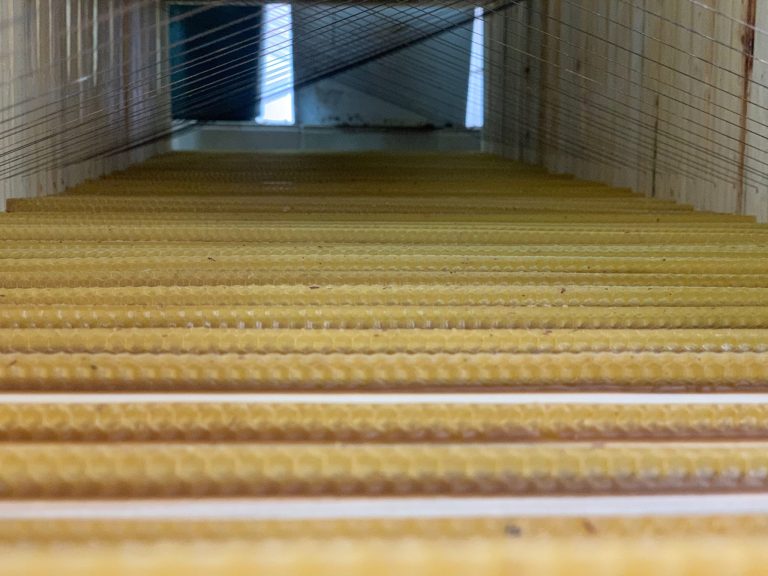 Wax foundation strips in brood frames